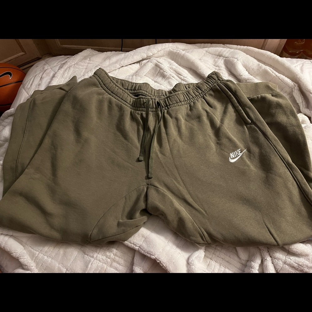 Nike green sweat pants in size large